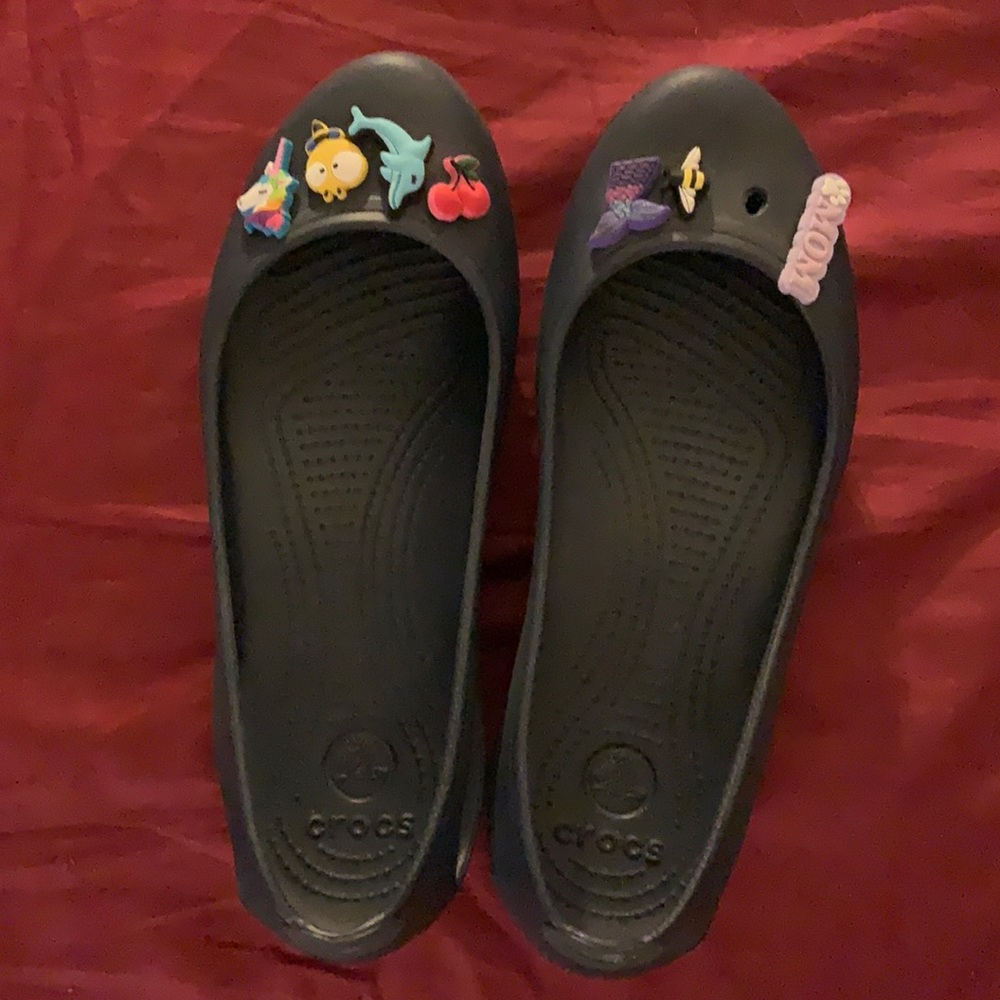 Practically new crocs (jibots not included but willing to sell)